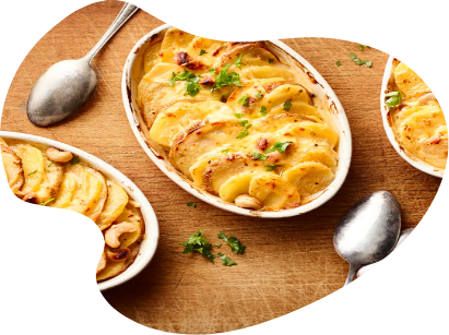 Rezept Vorschau für Sahne-Kartoffelgratin mit Brokkoli in einer Auflaufform